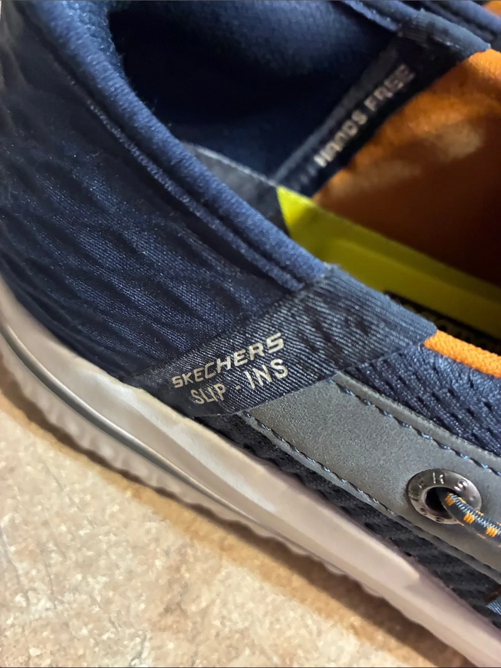 Skechers Men's Size 12 Navy Knit Slip-On Sneakers with Orange Liner